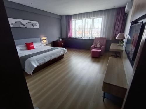 Imagen de la habitación del Hotel Junyi Jinhua Wucheng District Yongkang Street. Foto 14