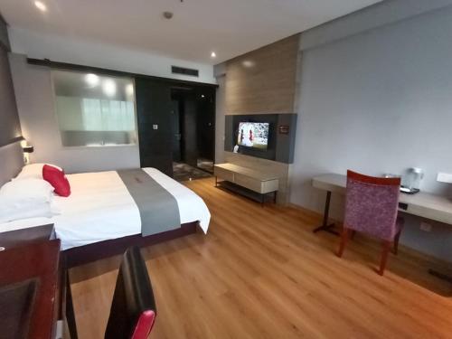 Imagen de la habitación del Hotel Junyi Jinhua Wucheng District Yongkang Street. Foto 15