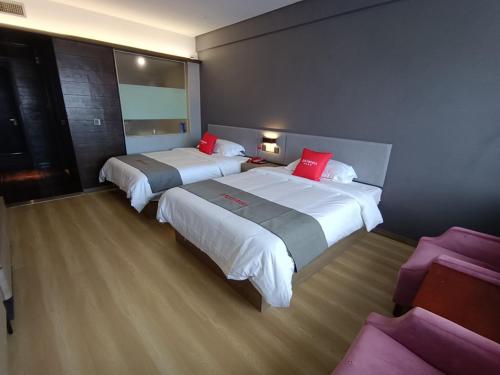 Imagen de la habitación del Hotel Junyi Jinhua Wucheng District Yongkang Street. Foto 18