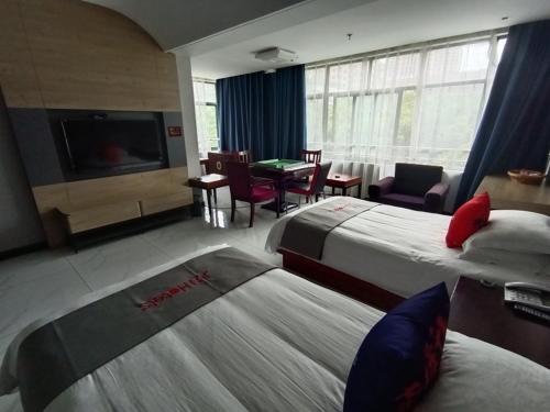 Imagen de la habitación del Hotel Junyi Jinhua Wucheng District Yongkang Street. Foto 20