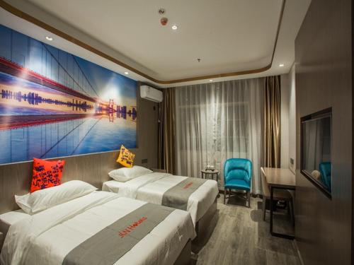 Imagen de la habitación del Hotel Junyi Jizhou District East Yangming Road. Foto 16