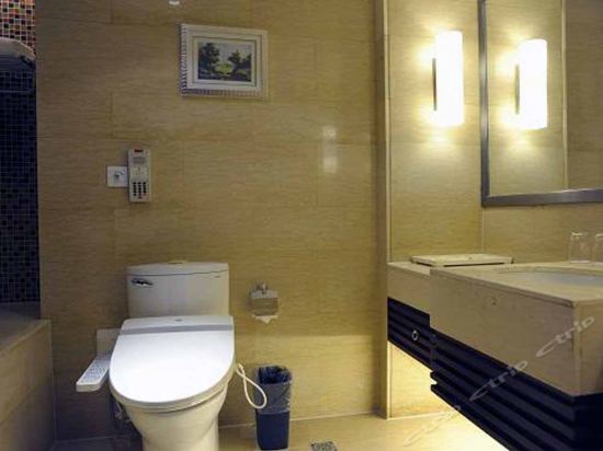 Imagen de la habitación del Hotel Junyi Wangchao. Foto 4