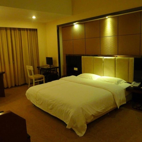 Imagen de la habitación del Hotel Junyue. Foto 2