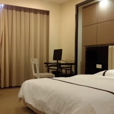 Imagen de la habitación del Hotel Junyue. Foto 3