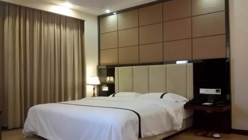 Imagen de la habitación del Hotel Junyue. Foto 7