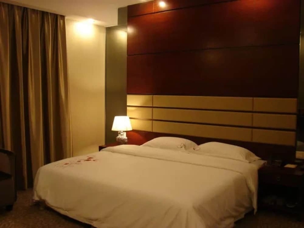 Imagen de la habitación del Hotel Junyue. Foto 11