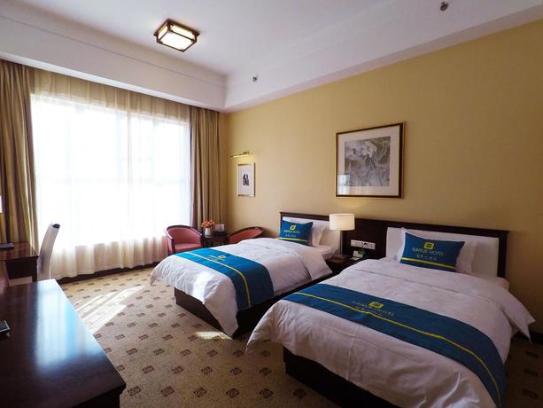 Imagen de la habitación del Hotel Junyue, Guangzhou. Foto 4