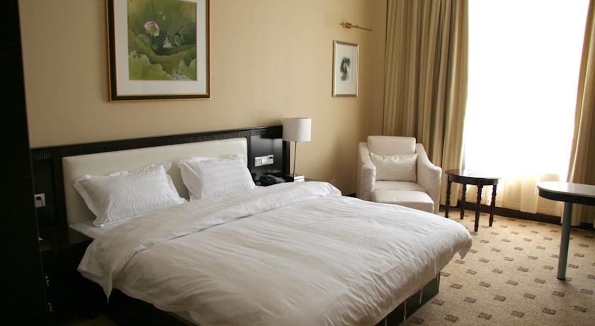 Imagen de la habitación del Hotel Junyue, Guangzhou. Foto 6