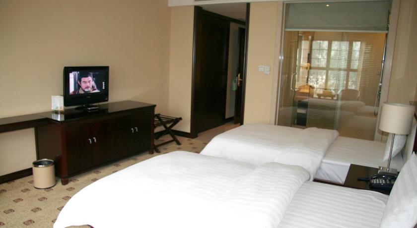 Imagen de la habitación del Hotel Junyue, Guangzhou. Foto 7