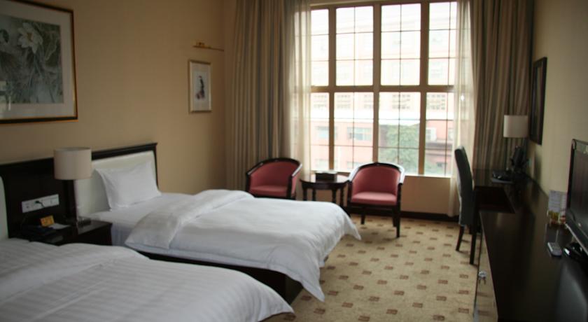 Imagen de la habitación del Hotel Junyue, Guangzhou. Foto 8