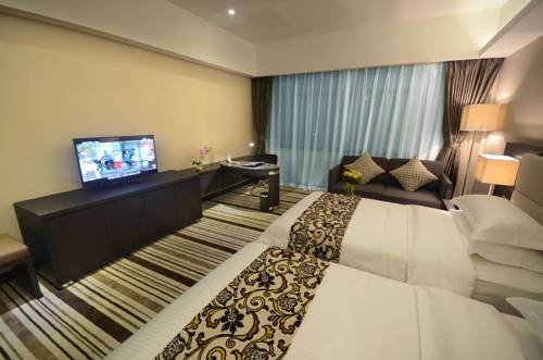 Imagen de la habitación del Hotel Junyue Internation. Foto 2