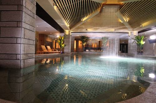 Imagen de la habitación del Hotel Junyue Internation. Foto 5