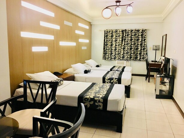 Imagen de la habitación del Hotel Jupiter Suites. Foto 14