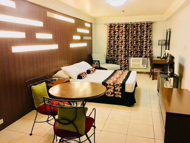Imagen de la habitación del Hotel Jupiter Suites. Foto 16