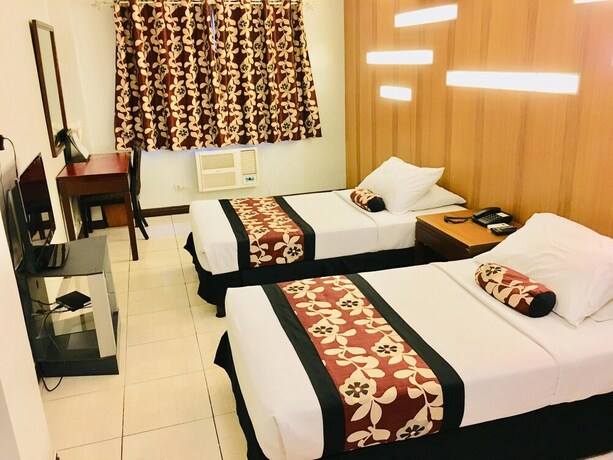 Imagen de la habitación del Hotel Jupiter Suites. Foto 26