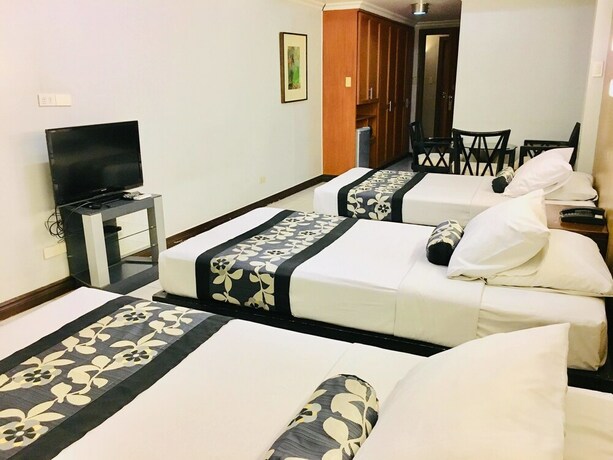 Imagen de la habitación del Hotel Jupiter Suites. Foto 30