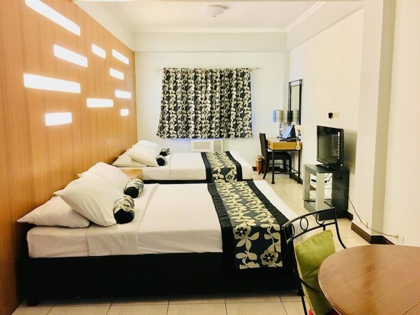 Imagen de la habitación del Hotel Jupiter Suites. Foto 34