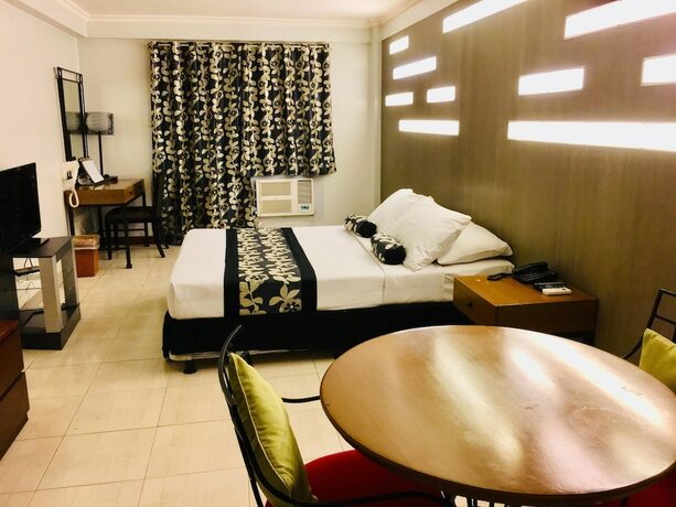 Imagen de la habitación del Hotel Jupiter Suites. Foto 35