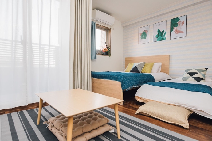Imagen de la habitación del Hotel Juso Afp Luxury Apartment. Foto 5