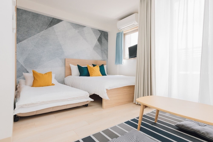 Imagen de la habitación del Hotel Juso Afp Luxury Apartment. Foto 9