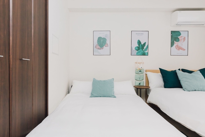 Imagen de la habitación del Hotel Juso Afp Luxury Apartment. Foto 11