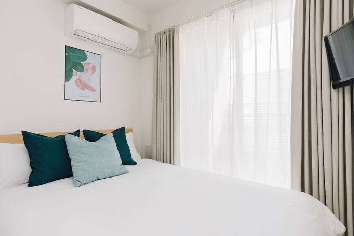 Imagen de la habitación del Hotel Juso Afp Luxury Apartment. Foto 12