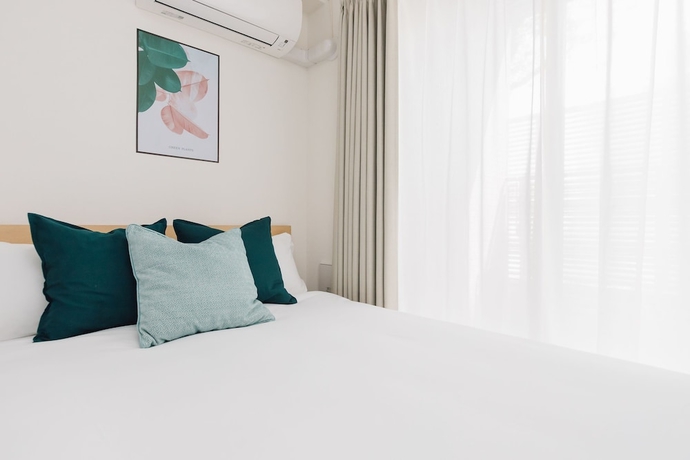 Imagen de la habitación del Hotel Juso Afp Luxury Apartment. Foto 13