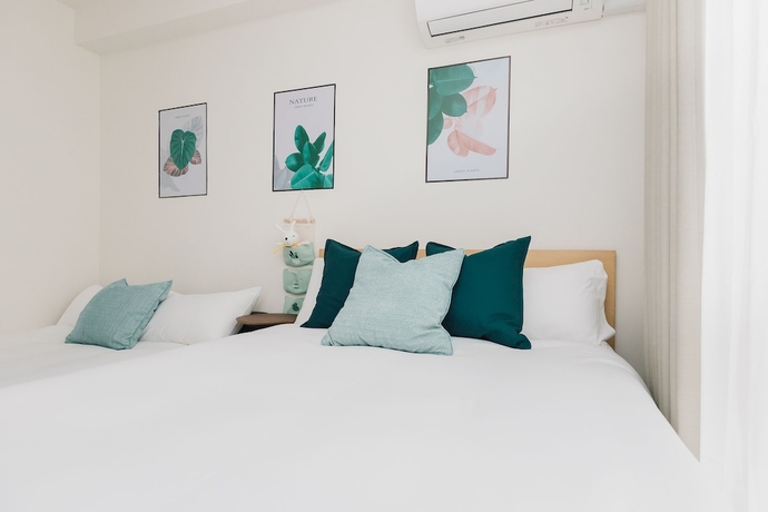 Imagen de la habitación del Hotel Juso Afp Luxury Apartment. Foto 14