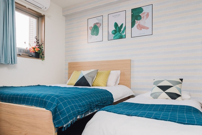 Imagen de la habitación del Hotel Juso Afp Luxury Apartment. Foto 15