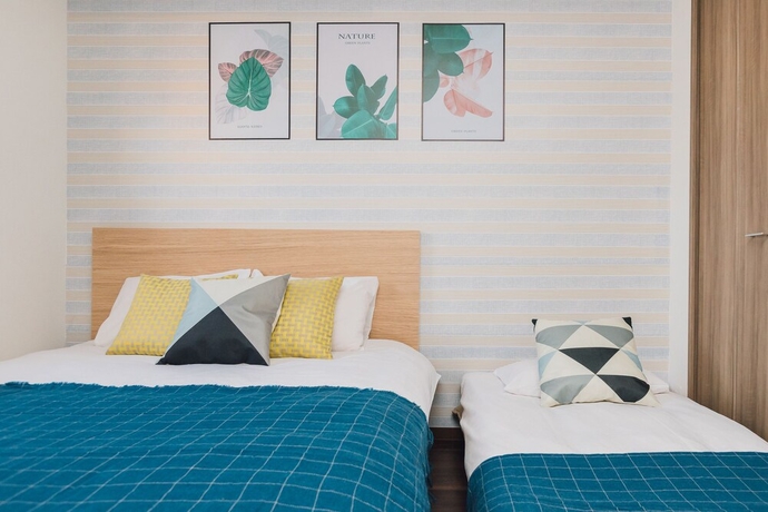Imagen de la habitación del Hotel Juso Afp Luxury Apartment. Foto 18