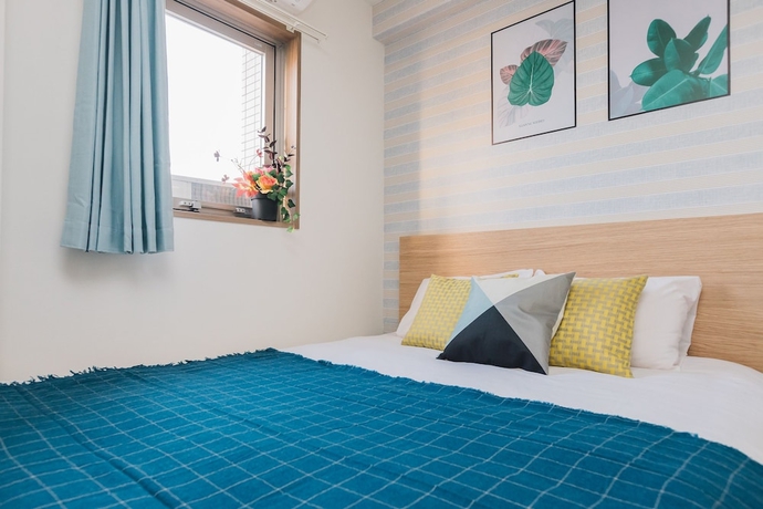 Imagen de la habitación del Hotel Juso Afp Luxury Apartment. Foto 19