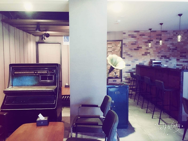 Imagen del bar/restaurante del Hotel Just Live Inn Keelung. Foto 3