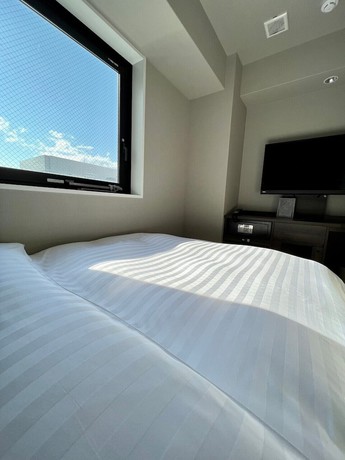 Imagen de la habitación del Hotel Just Sleep Osaka Shinsaibashi. Foto 11