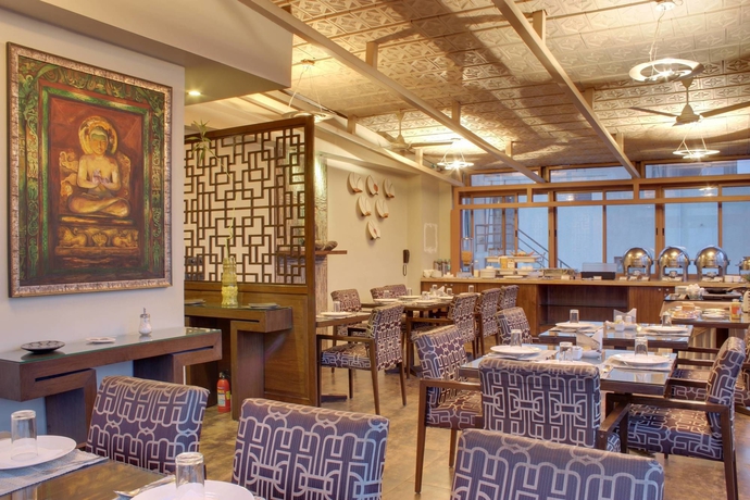 Imagen del bar/restaurante del Hotel Justa Mg Road. Foto 4