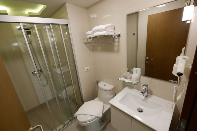 Imagen de la habitación del Hotel Justice, Bangkok. Foto 12