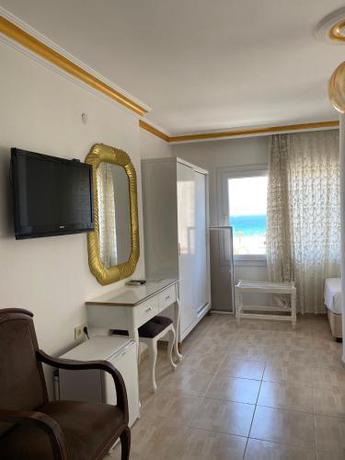 Imagen de la habitación del Hotel Justin Blue Otel. Foto 16