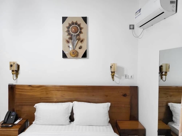 Imagen de la habitación del Hotel Justina Guest House. Foto 8