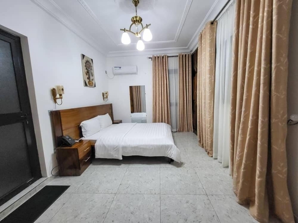 Imagen de la habitación del Hotel Justina Guest House. Foto 13