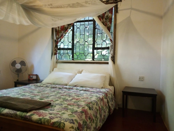 Imagen de la habitación del Hotel Jutland Lodge Moshi. Foto 5
