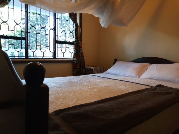 Imagen de la habitación del Hotel Jutland Lodge Moshi. Foto 6