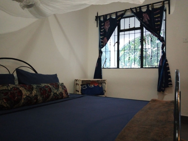 Imagen de la habitación del Hotel Jutland Lodge Moshi. Foto 10