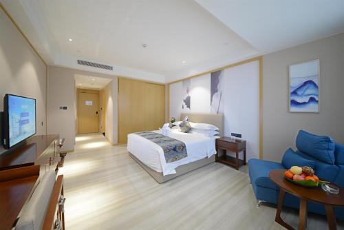 Imagen de la habitación del Hotel Juzhi Herton. Foto 6
