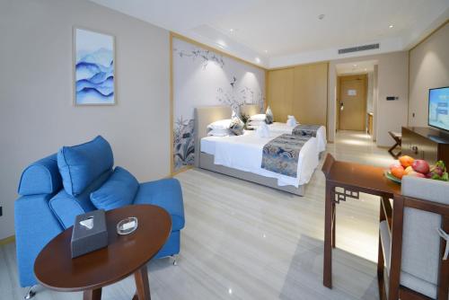 Imagen de la habitación del Hotel Juzhi Herton. Foto 7