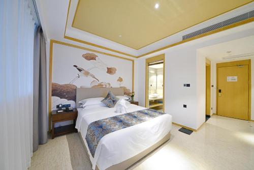 Imagen de la habitación del Hotel Juzhi Herton. Foto 8