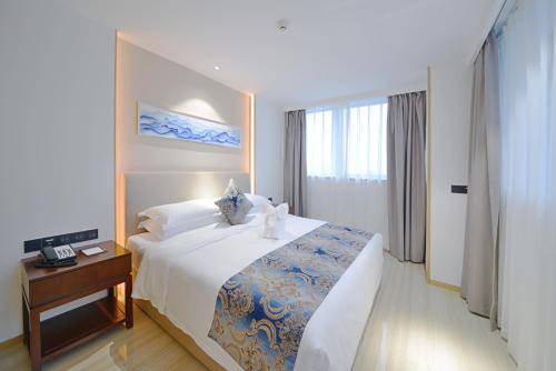 Imagen general del Hotel Juzhi Herton. Foto 4