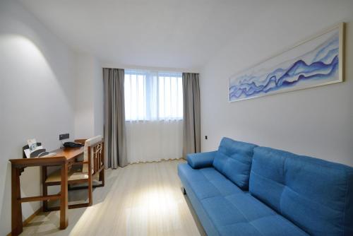 Imagen general del Hotel Juzhi Herton. Foto 5
