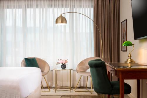 Imagen de la habitación del Hotel Jw Marriott Berlin. Foto 11