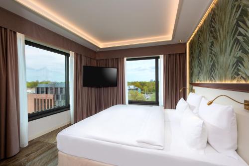 Imagen de la habitación del Hotel Jw Marriott Berlin. Foto 13