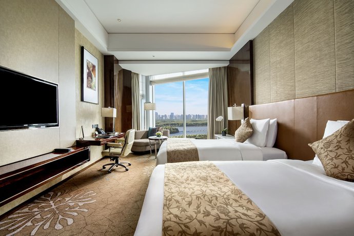 Imagen de la habitación del Hotel Jw Marriott Harbin River North. Foto 14