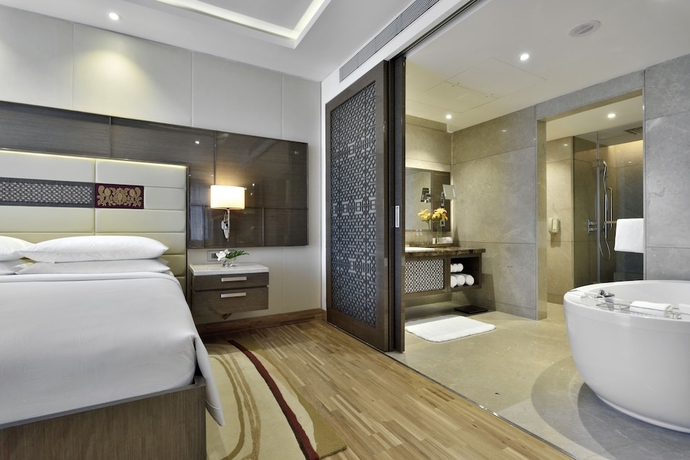 Imagen de la habitación del Hotel Jw Marriott Mumbai Sahar Airport. Foto 8